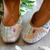 Colours of Sea & Sand Off-white Embroidered Jutti